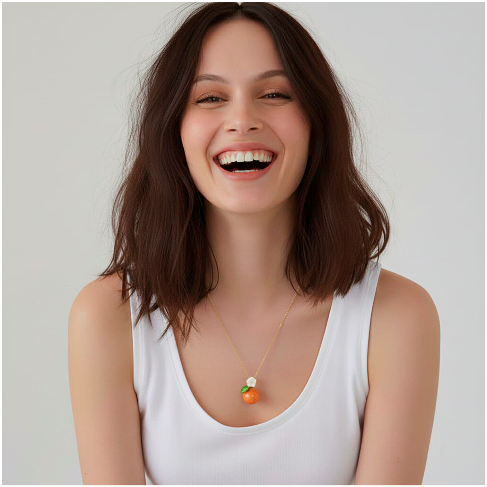 Colgante naranja y flor con hoja