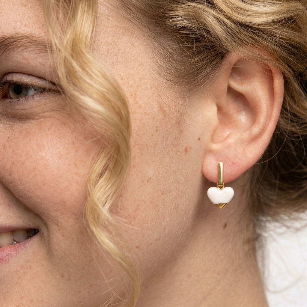 Pendientes oro corazón barra acero