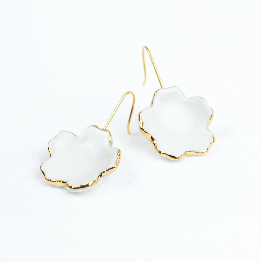 Conjunto flor borde oro