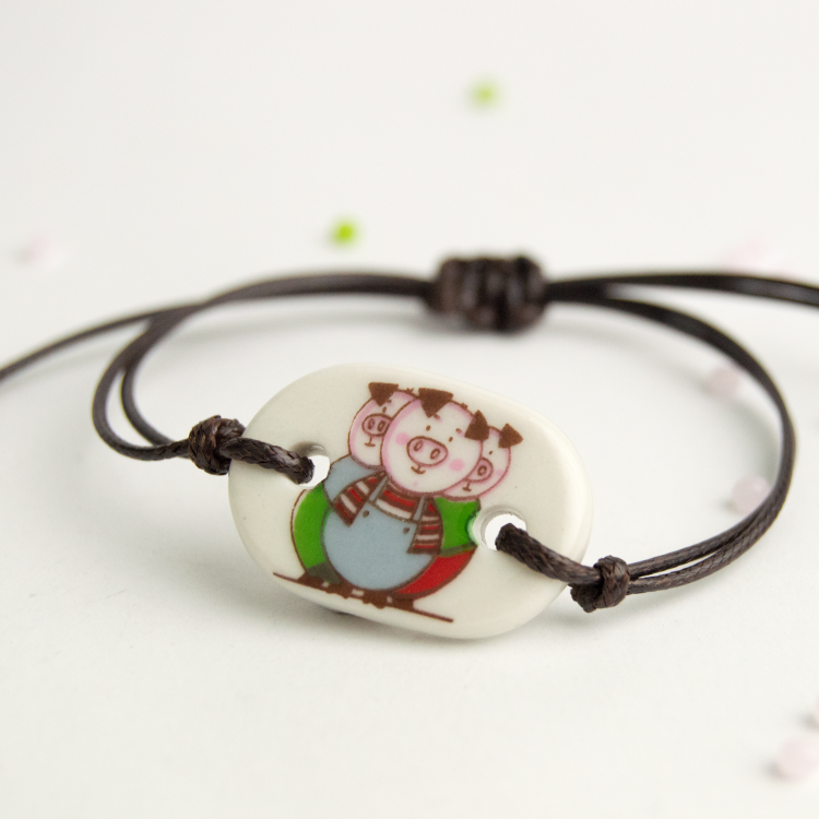 Pulsera Tres cerditos pq.